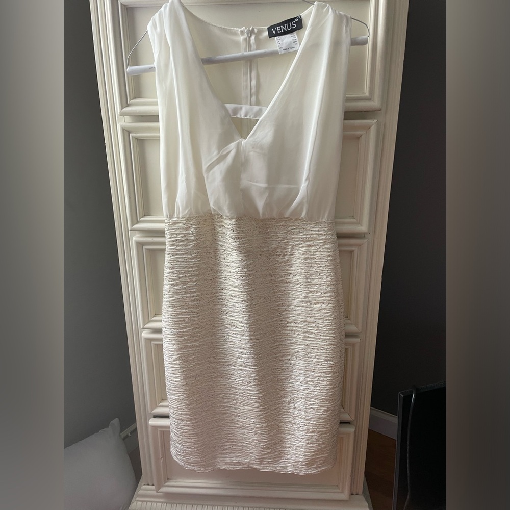 Venus dress.  Beautiful!  Top of dress us sheet